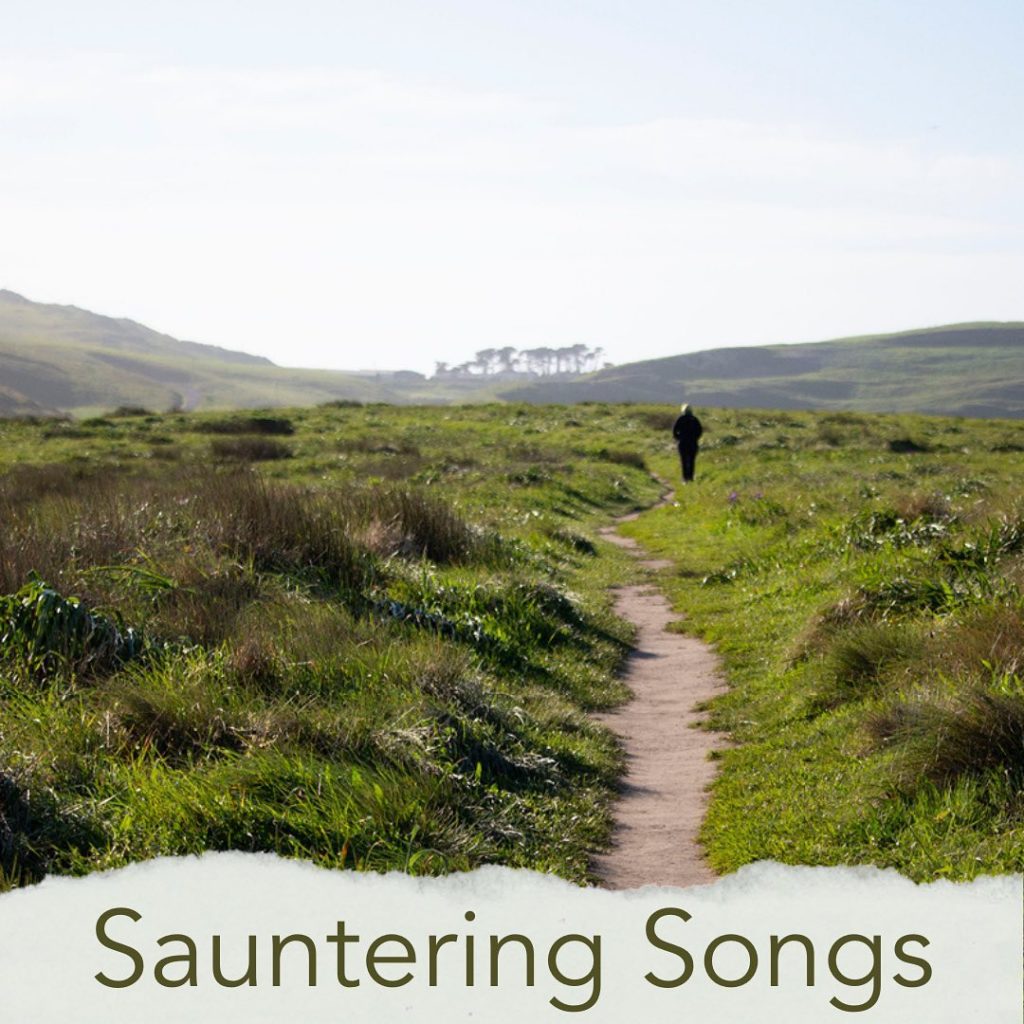 Title reads "Sauntering Songs" with photo of a distant figure walking on a footpath in grass-covered hills