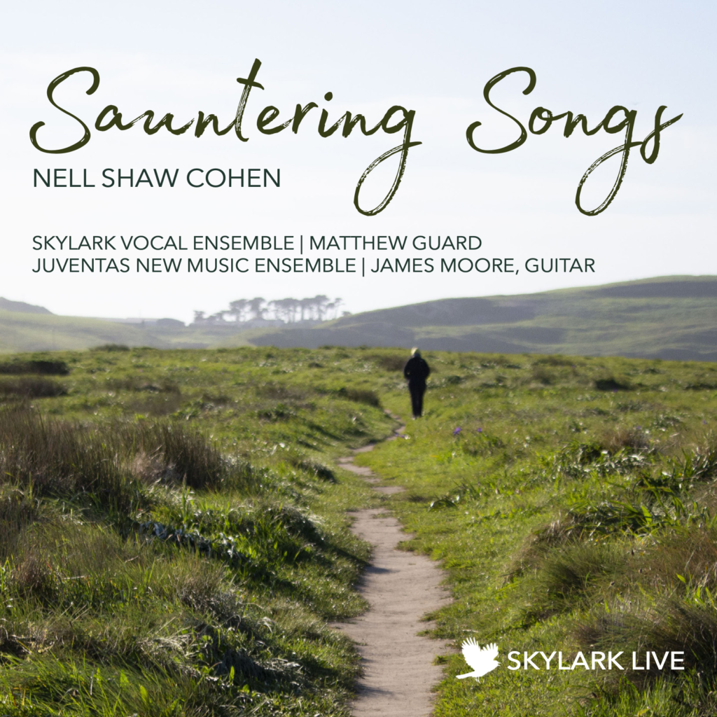 Album cover art for "Sauntering Songs," with title and credits. Photograph of a distant figure walking on a dirt path through grassy hills on a sunny day. Bird logo for "Skylark Live" in bottom corner.
