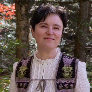 Nell Shaw Cohen in an autumnal forest